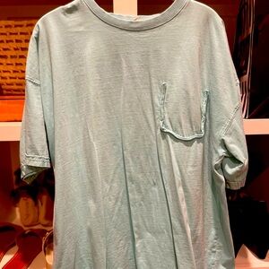 Easel size medium aqua t-shirt.